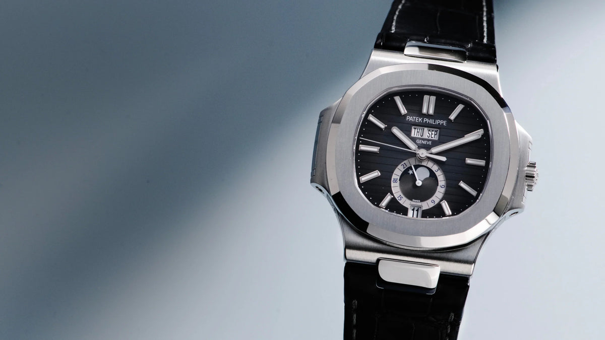 Patek Philippe Nautilus Annual Calendar 5726A in steel with black gradient dial, moon phase and black leather strap