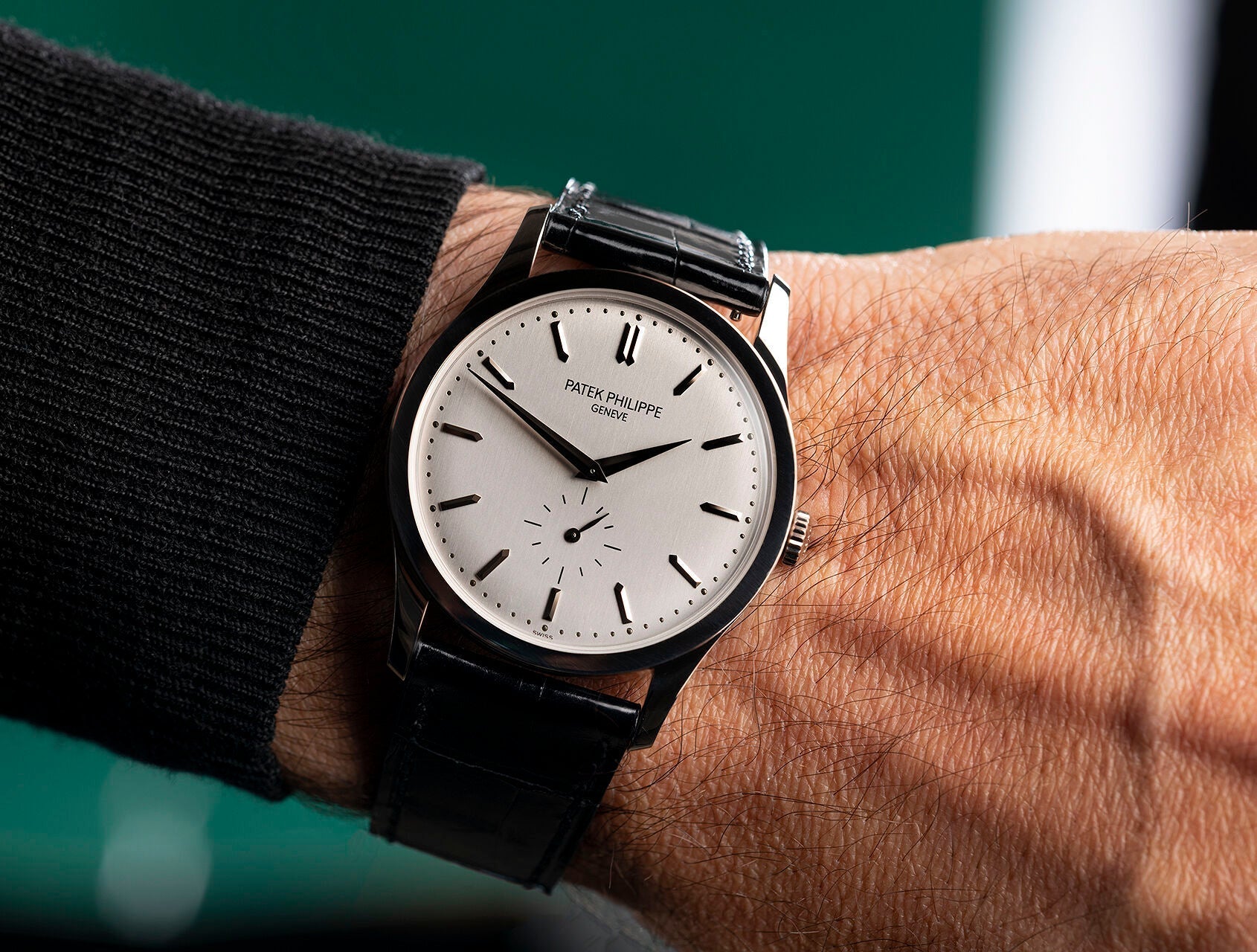 Patek Philippe Calatrava reference 5227J-001 in 39mm yellow gold with ivory lacquered dial and hinged Officer's caseback