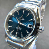 Omega Seamaster Aqua Terra Blue “Teak” Dial – Ref. 231.10.39.21.03.001
Full Set