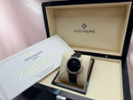 Patek Philippe Calatrava Ref. 5196 with black dial in original box, accompanied by Certificate of Origin on pink satin background, Full Set presentation