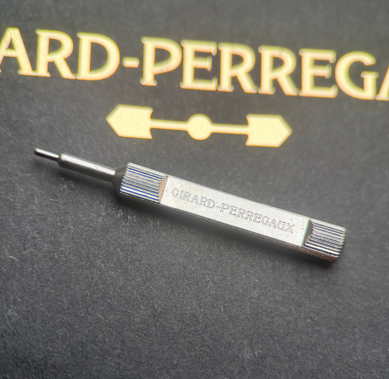 Girard-Perregaux corrector tool on Girard-Perregaux presentation cloth